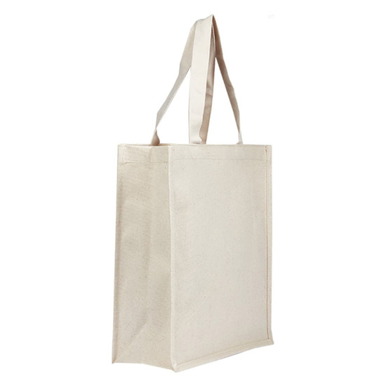 A light beige tote bag with two handles and a simple design, featuring a logo on one side.
