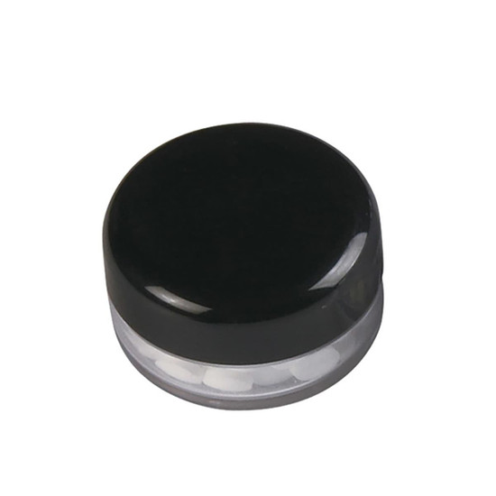 A black screw lid jar with a transparent base, containing sugar-free mints. 