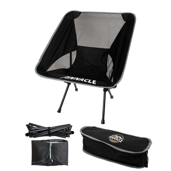 A black folding chair with a mesh seat and grey accents, accompanied by its carrying bag and assembled frame.