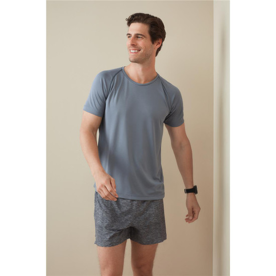 A men's active team raglan t-shirt in grey, paired with dark shorts. The shirt features a crew neck and short sleeves.