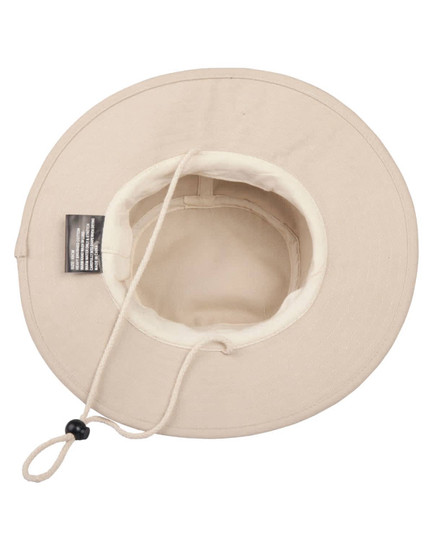 A cream-coloured brim hat with a chin strap and inner lining, featuring a logo inside.