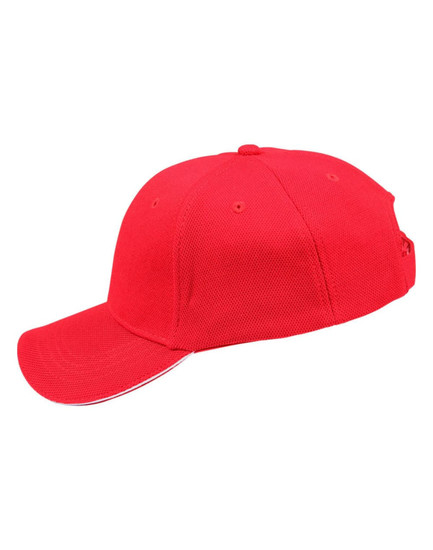 A red cap made of pique mesh fabric features a curved brim and has a logo on the side.