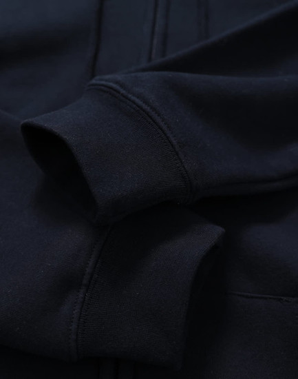 A men's full-zip fleecy hoodie in navy, featuring cuffed sleeves and a smooth fabric texture.