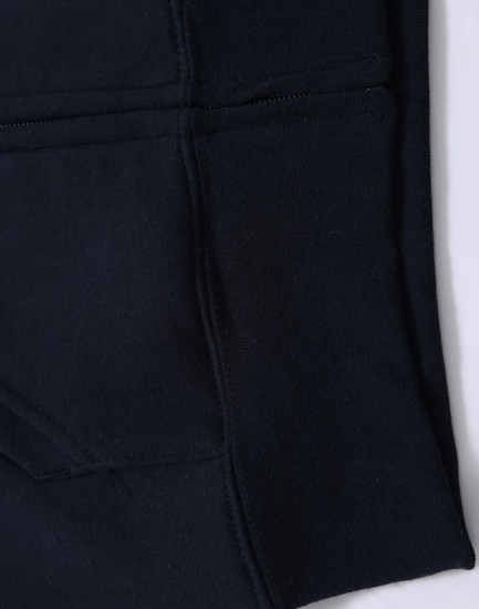 A black kid's full-zip fleecy hoodie featuring a kangaroo pocket and a smooth texture. It has a logo detail.