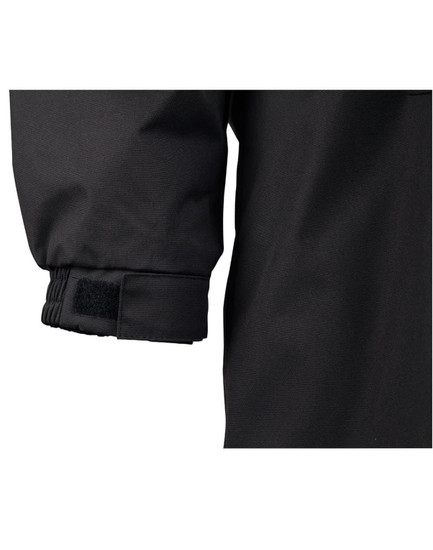 A close-up of the cuff of a black Long Line Stadium Jacket featuring adjustable fastenings.