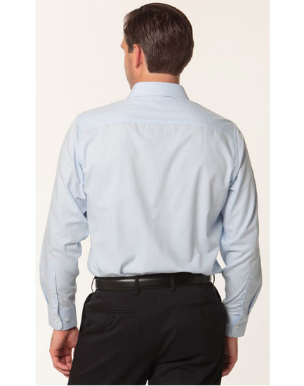 A long sleeve men's button-up shirt in light blue herringbone pattern, featuring a branded logo.
