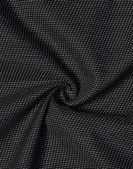 A black fabric with a pin dot pattern, featuring a soft stretch texture.