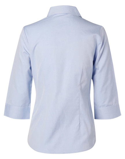 A light blue women's button-up shirt with 3/4 sleeves and a collar, featuring a branding logo.