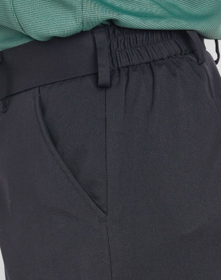 Ladies' utility cargo shorts in black featuring side pockets and an elastic waistband. Includes branding.
