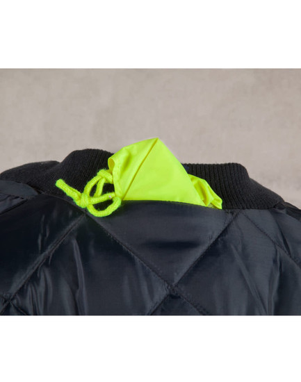 A hi-vis two-tone flying jacket in black and bright yellow, featuring a quilted design and a hood tucked into the collar.