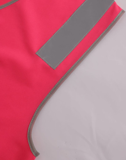 A bright pink safety vest featuring reflective shoulder tapes and contrasting grey edging. It includes a logo.