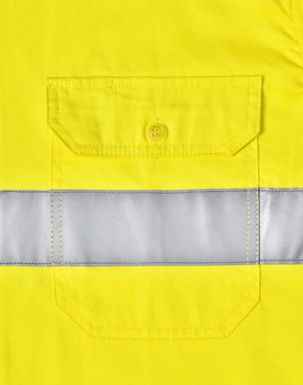 A bright yellow long-sleeve safety shirt featuring a reflective tape and a buttoned pocket. It includes a logo.
