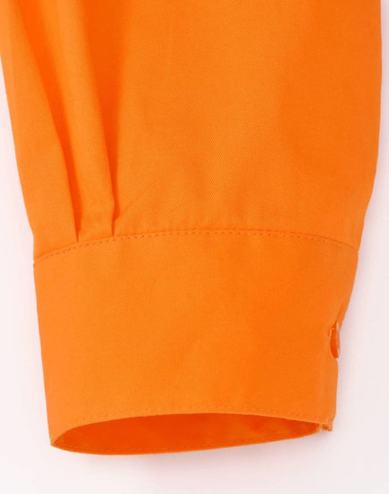 An orange long-sleeved shirt cuff with a button detail, designed for workwear. It features perforated tape.