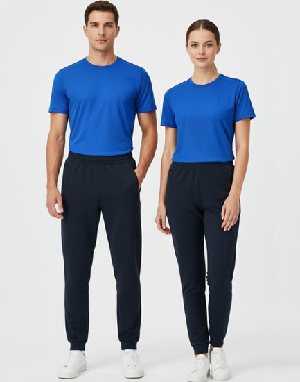 Two models wearing blue t-shirts and black poly/cotton terry sweat pants, standing side by side against a light background.