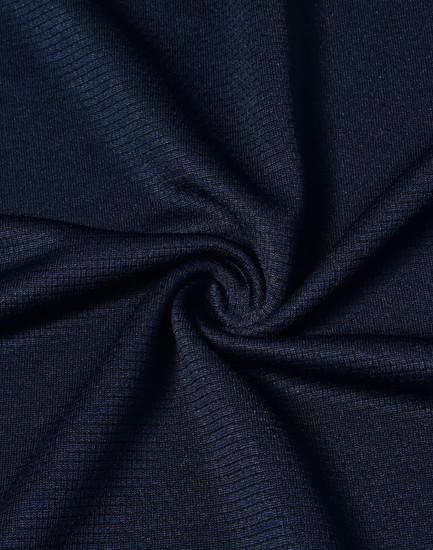 A close-up of navy fabric featuring a textured weave, suitable for lightweight performance t-shirts.
