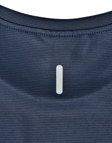 A close-up of a navy blue ladies' ultra lightweight performance t-shirt, featuring a subtle logo at the neckline.
