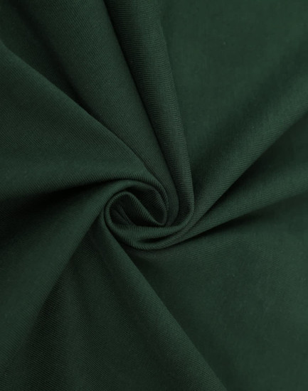 A close-up of dark green fabric displaying a smooth texture, ideal for T-shirts. The material has a subtle stretch.