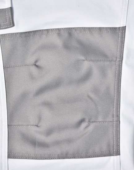 A close-up of unisex utility stretch cargo work pants in white with a grey patch pocket. The pants have a logo detail.