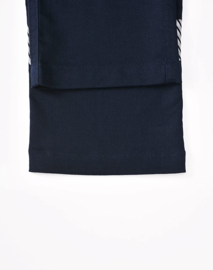 A pair of navy blue unisex cotton stretch ripstop segmented work pants, featuring a fold-over leg design.