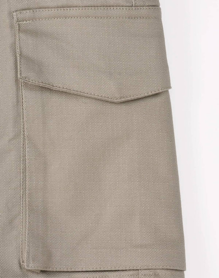 Unisex cotton stretch ripstop work shorts in a light beige colour featuring side pockets and a logo.