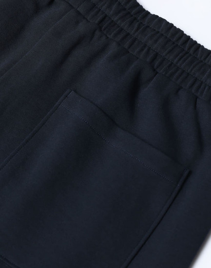 Unisex Airlayered CVC sweatpants in navy blue, featuring an elastic waistband and a back pocket.