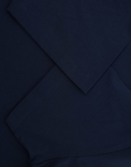 A navy blue premium cotton short-sleeve T-shirt with neatly folded sleeves. It features a logo on the fabric.