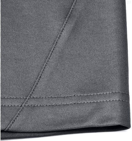 A close-up of the hem and fabric of a grey men's sustainable polo shirt, featuring a stitched edge.