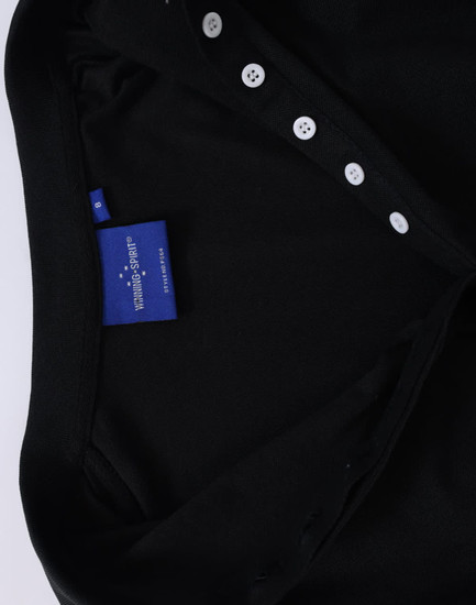 A black ladies' polo shirt featuring a collared neck and button details. It includes a label inside the collar.