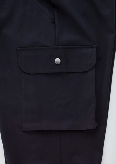 A pair of black cargo pants featuring a large side pocket with a snap closure and a smooth fabric finish.