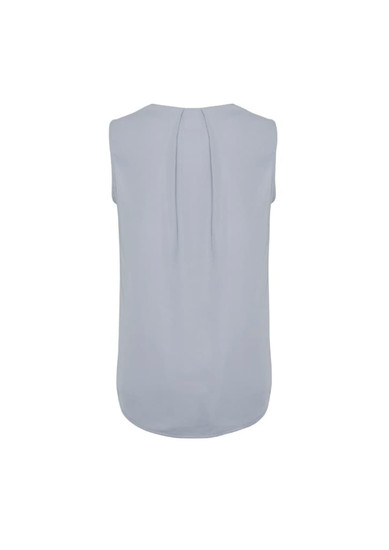 A pale blue sleeveless blouse with pleat detail at the back and a rounded hemline. It has a branding logo.