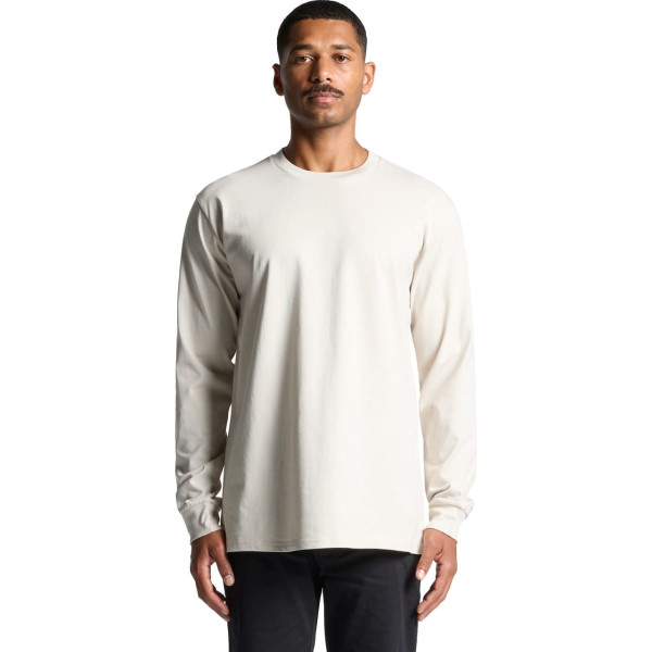 A long-sleeve t-shirt in a creamy beige colour with a logo on the front.