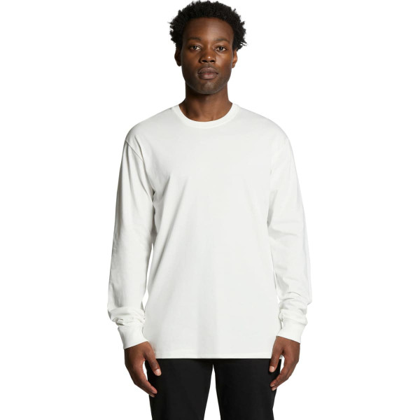 A long-sleeve white T-shirt featuring a logo, modelled by a person against a plain background.