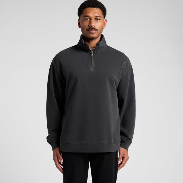 A black half-zip jacket with a relaxed fit and a small zippered collar. It features a logo on the chest.