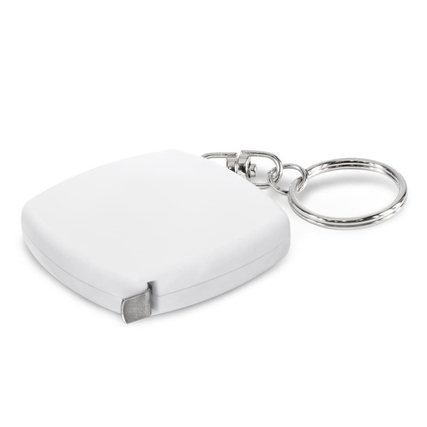 A white tape measure key ring with a silver keychain attachment.