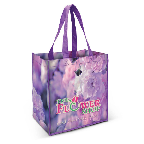 A purple tote bag featuring floral designs and a logo, with sturdy handles for easy carrying.