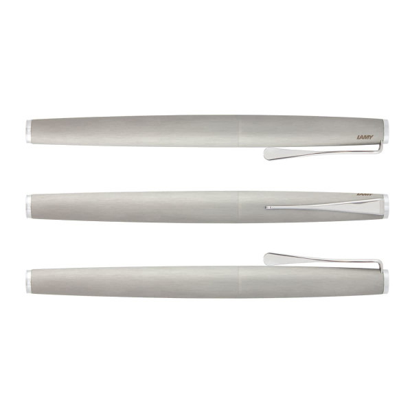 A metallic silver Lamy Studio Rolling Ball Pen displayed from multiple angles, featuring a sleek design and clip.