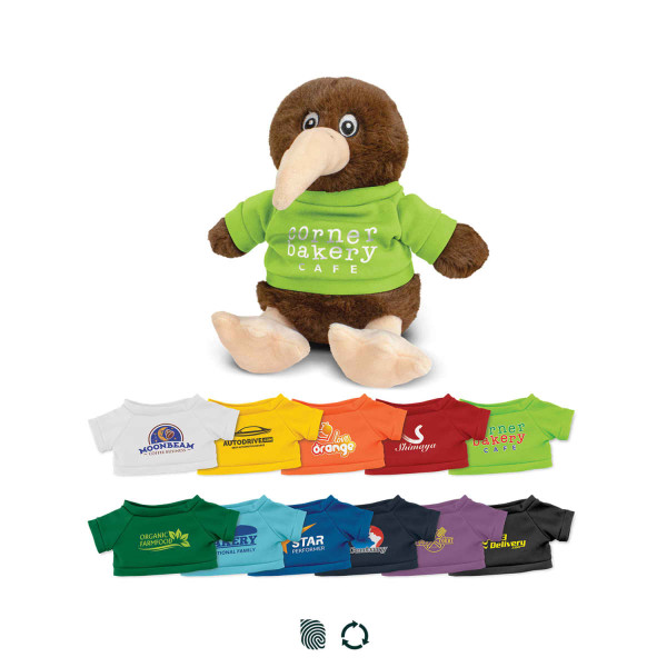 A brown kiwi plush toy wearing a green shirt, surrounded by various smaller shirts in different colours and designs.
