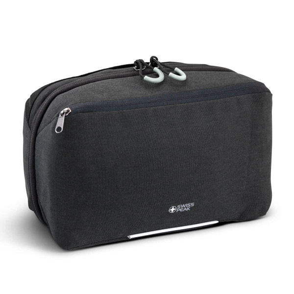 A dark grey toiletry bag with dual zippers and a branding logo, featuring a sleek and compact design.