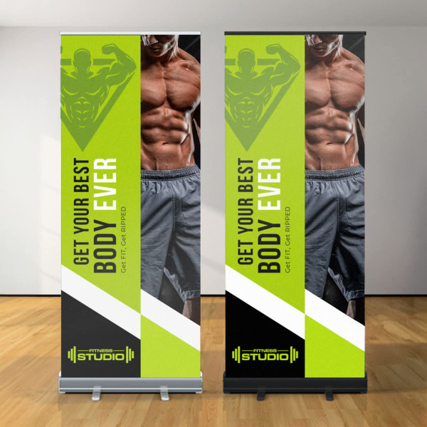 Two premium pull-up banners featuring a muscular figure and vibrant green and black designs. Each banner includes branding elements.
