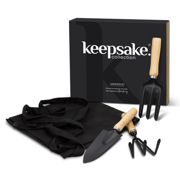 A black gardening set featuring a trowel, hand rake, and a storage bag with wooden handles, packaged in a sleek box.