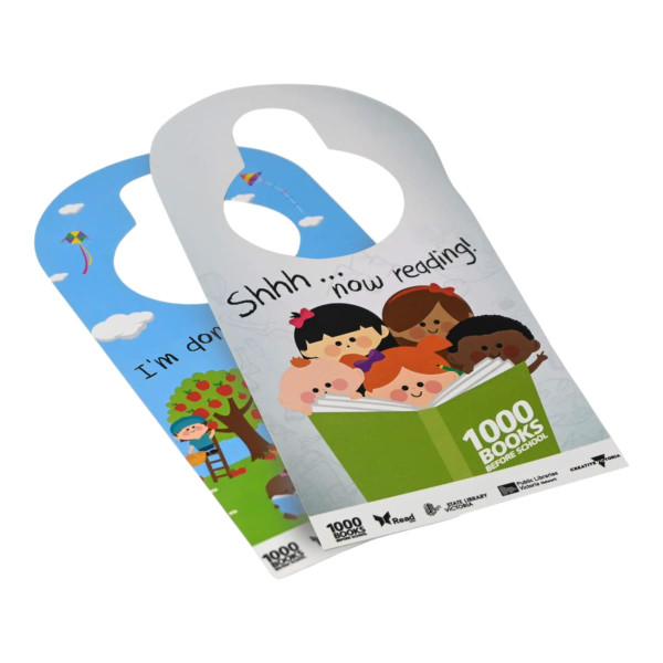A double-sided door hanger featuring colourful illustrations of children and nature, with playful text and a logo.