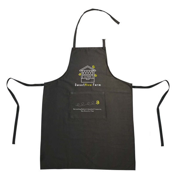 A recycled cotton apron in black featuring the logo "SweetHive Farm" and a front pocket.