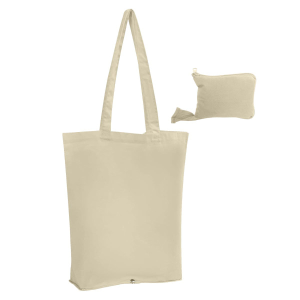 A beige foldable calico tote bag with long handles, accompanied by a small, compact storage pouch.