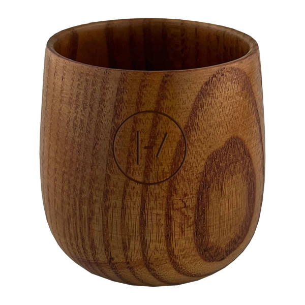 A wooden coffee cup in a warm brown tone, featuring a circular logo on the side.