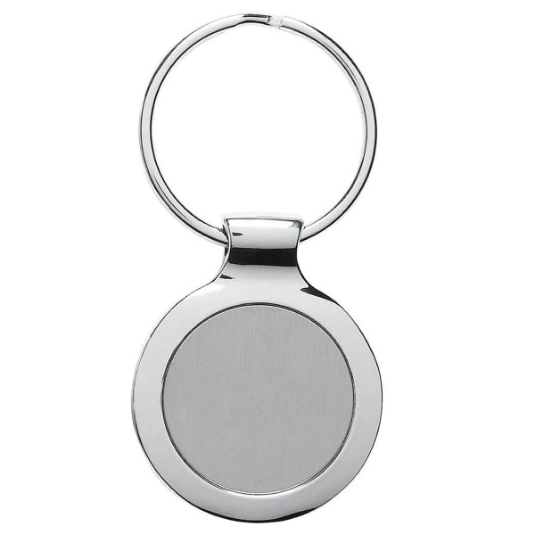 A silver discus key ring with a circular design and a smooth, plain surface, featuring a branding logo.
