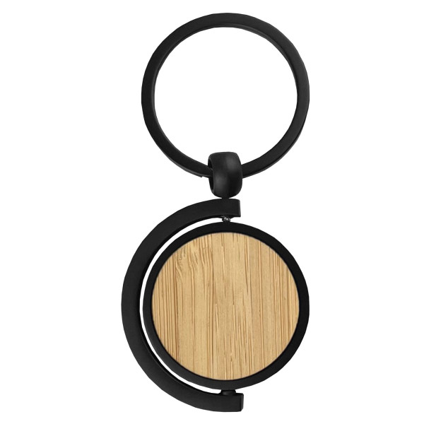 A round bamboo key ring with a black metal attachment, featuring a smooth wooden surface.