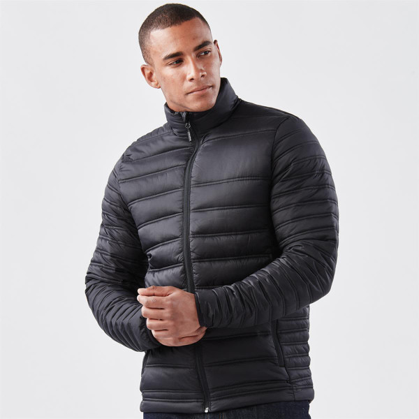 A black Men's Basecamp Thermal Jacket featuring a zip front and textured padding, with a small logo on the chest.