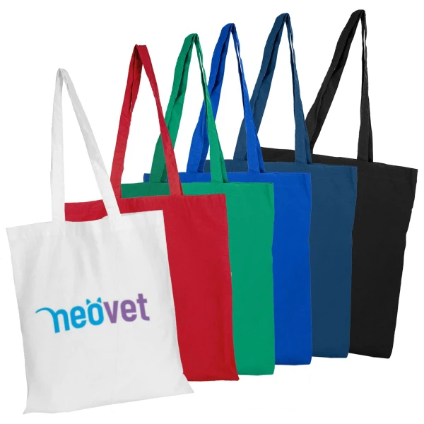 Coloured calico tote bags in red, blue, green, black, and white featuring a logo on the white bag.