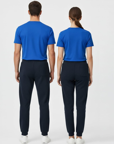 Adults' poly/cotton terry sweat pants in navy, featured on two models wearing blue tops, with a logo on the pants.