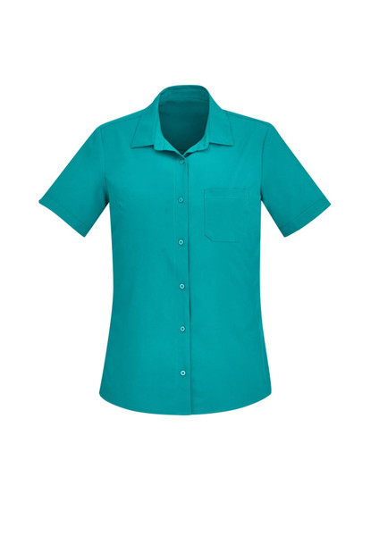 A plain short sleeve shirt in a vibrant teal colour, featuring a collar and a front pocket, with a logo.